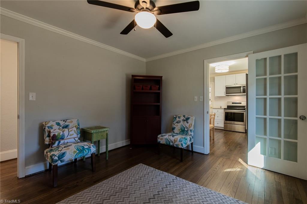 604 Ashe Street High Point, NC 27262 - Photo 14 of 23 Sitting room right off the kitchen with classic glass panel doors