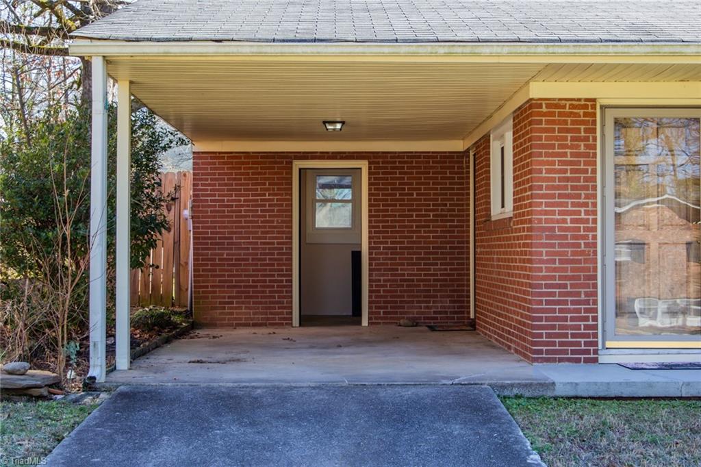 604 Ashe Street High Point, NC 27262 - Photo 3 of 23 Carport view with entrance to laundry room
