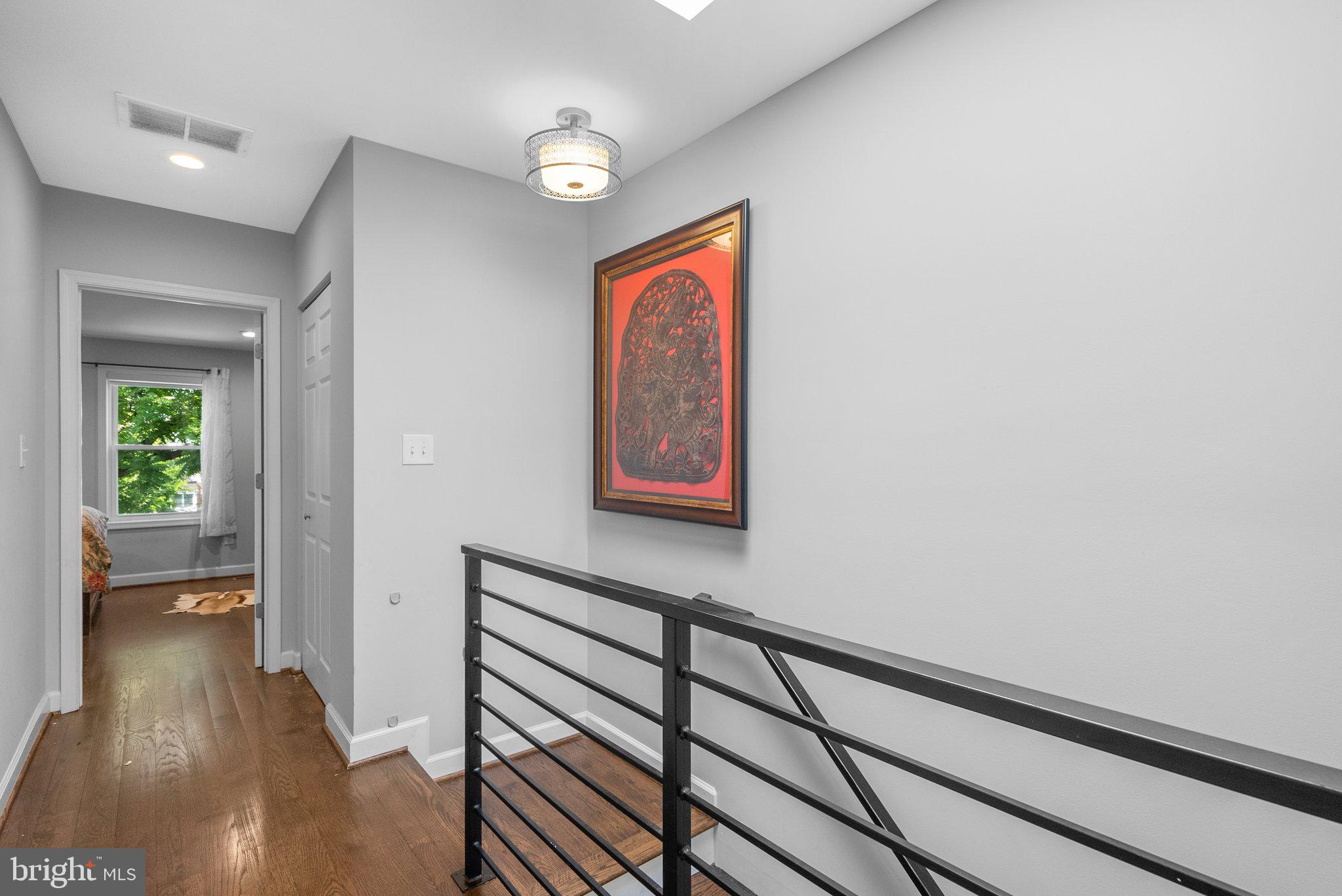 1275 Oates Street Northeast Washington, DC 20002 - Photo 17 of 40 a view of hallway with wooden floor
