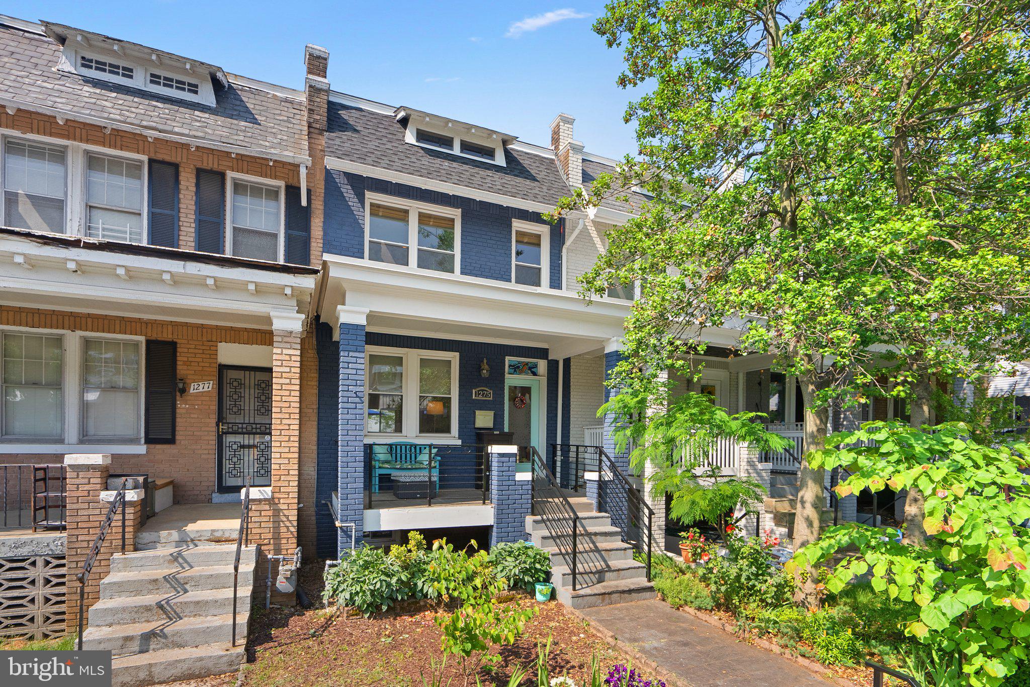 1275 Oates Street Northeast Washington, DC 20002 - Photo 40 of 40 front view of a brick house with a large windows