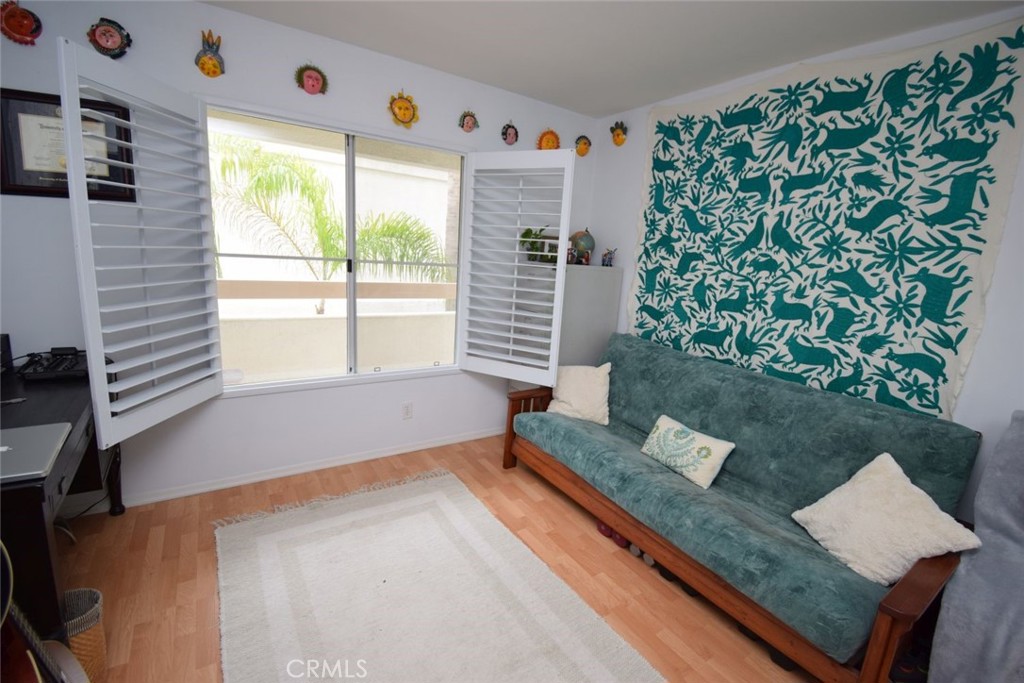 17 La Paloma Dana Point, CA 92629 - Photo 11 of 36 a living room with furniture and a window