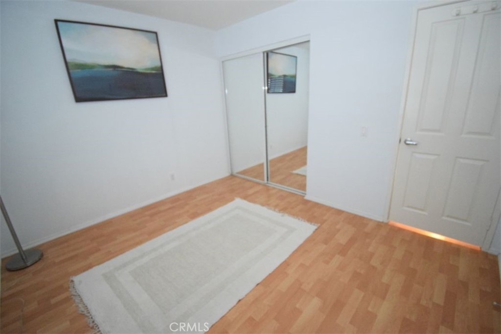 17 La Paloma Dana Point, CA 92629 - Photo 21 of 36 a view of a big room with wooden floor and cabinet