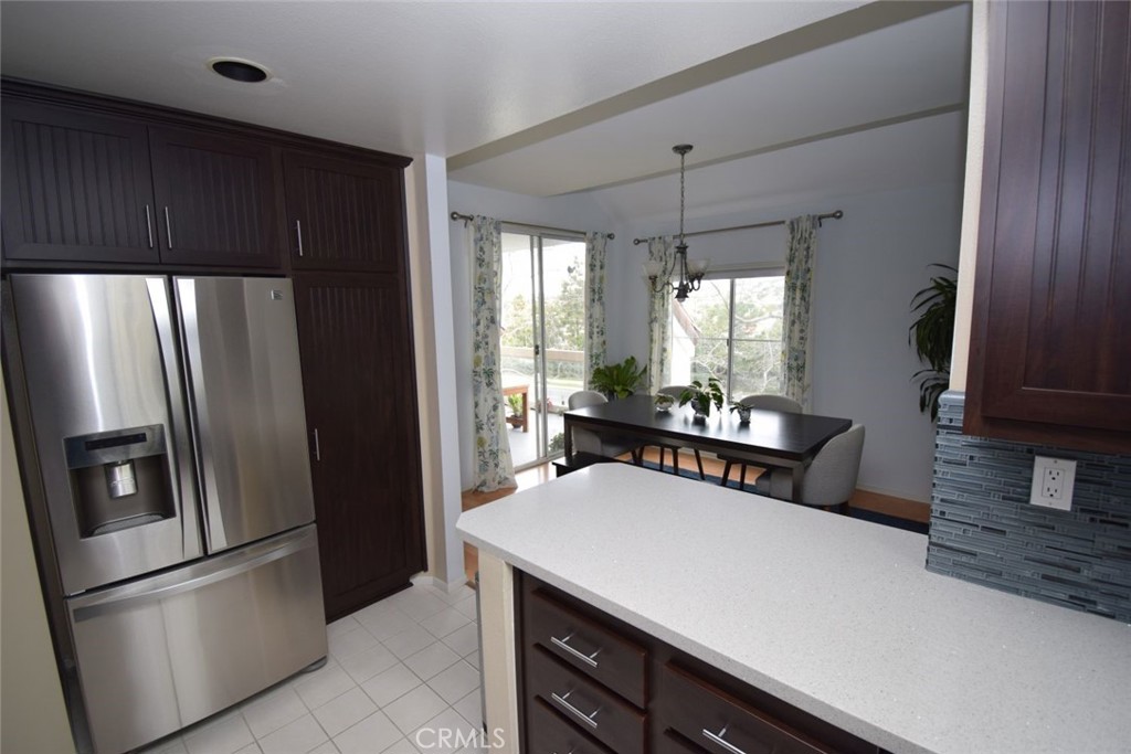17 La Paloma Dana Point, CA 92629 - Photo 23 of 36 a kitchen with stainless steel appliances a refrigerator and a stove