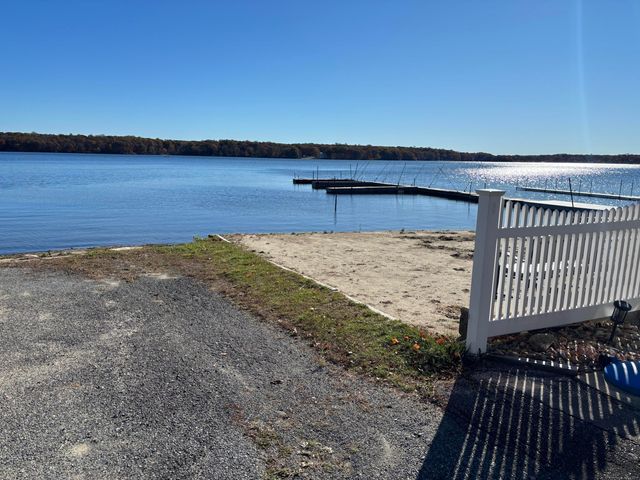 a view of a balcony with an ocean view