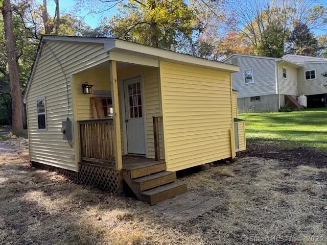 a view of a back yard of the house
