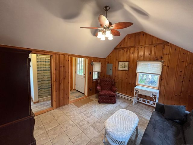 a living room with furniture and a window