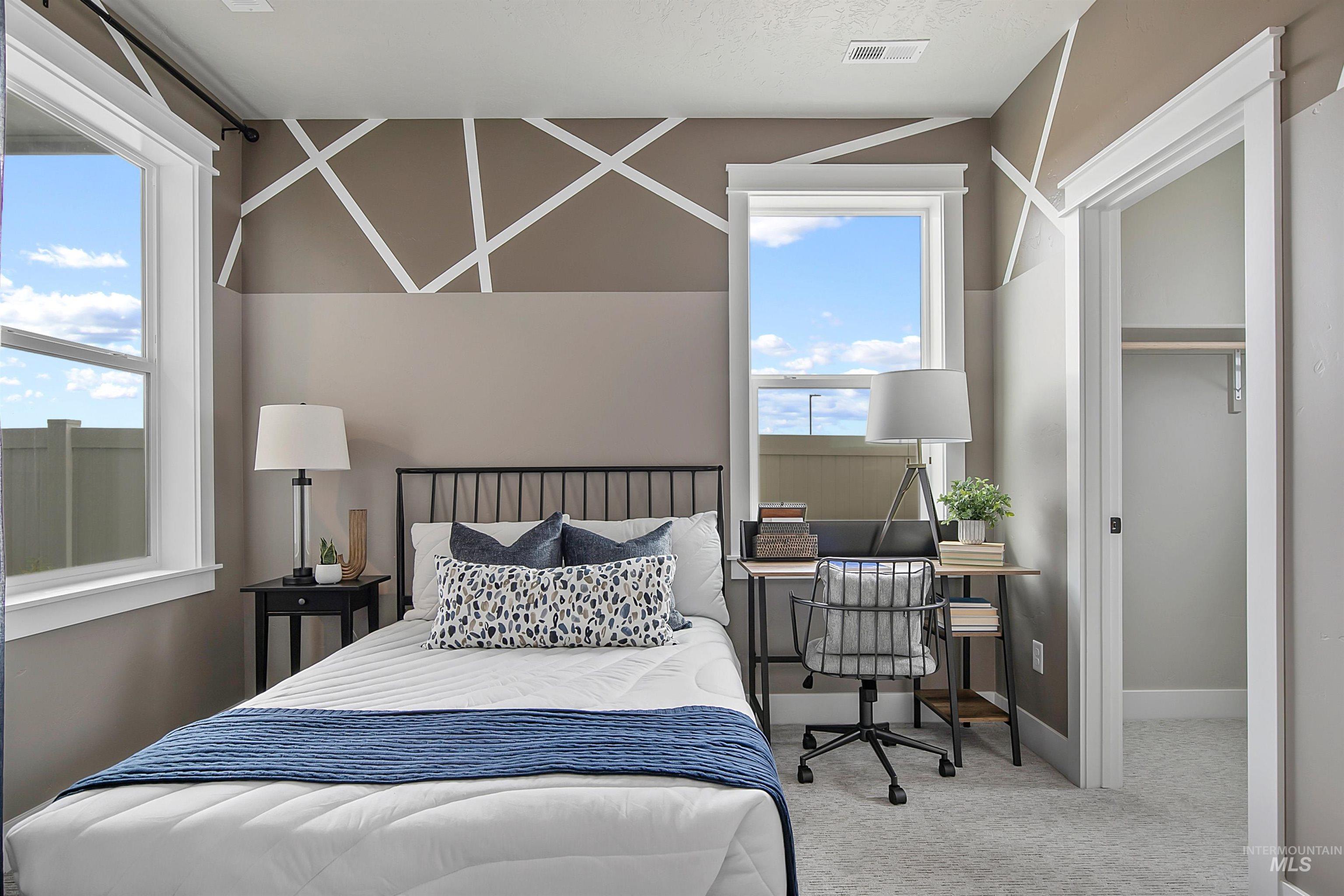 6061 West Parachute Drive Meridian, ID 83646 - Photo 2 of 5 Carpeted bedroom with baseboards