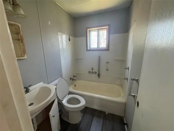 a bathroom with a sink and a toilet