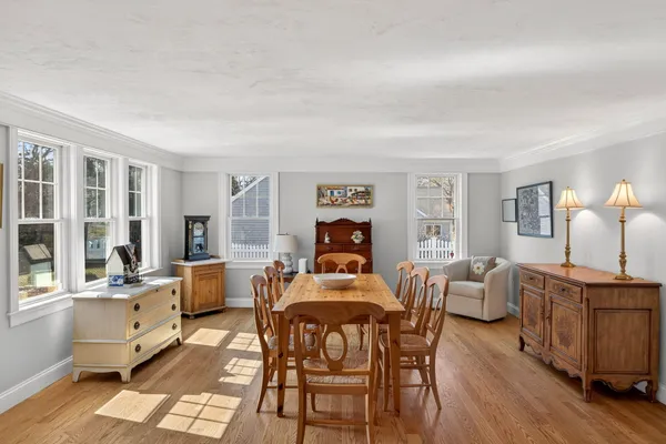 a living room with furniture and a table