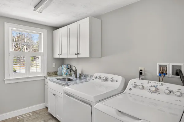 a bathroom with a sink and a bathtub