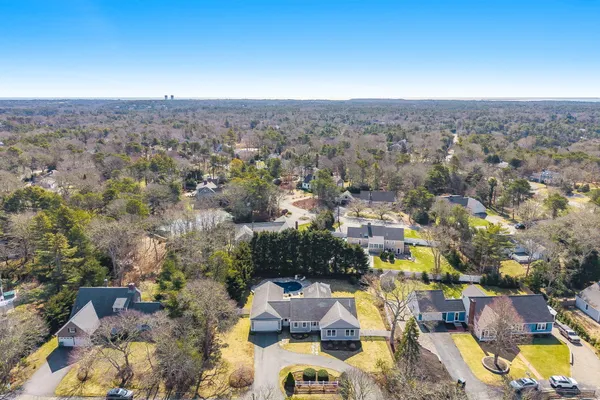 an aerial view of residential house with outdoor space