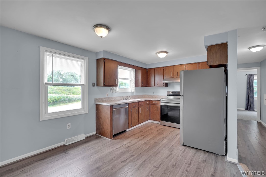 590 Potters Road West Seneca, NY 14224 - Photo 25 of 50 Upper Unit: Kitchen / Dining Area