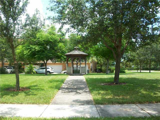 4508 Danson Way Delray Beach, FL 33445 - Photo 24 of 25 a front view of a house with a yard