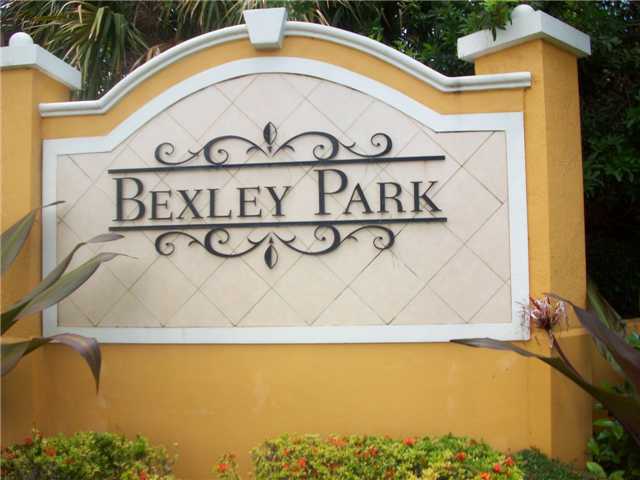 4508 Danson Way Delray Beach, FL 33445 - Photo 25 of 25 a street sign on a wall next to a building
