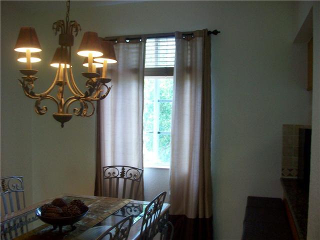 4508 Danson Way Delray Beach, FL 33445 - Photo 5 of 25 a table and chairs in a room
