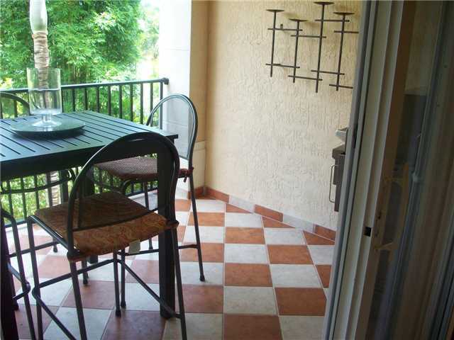 4508 Danson Way Delray Beach, FL 33445 - Photo 8 of 25 a view of a balcony with furniture