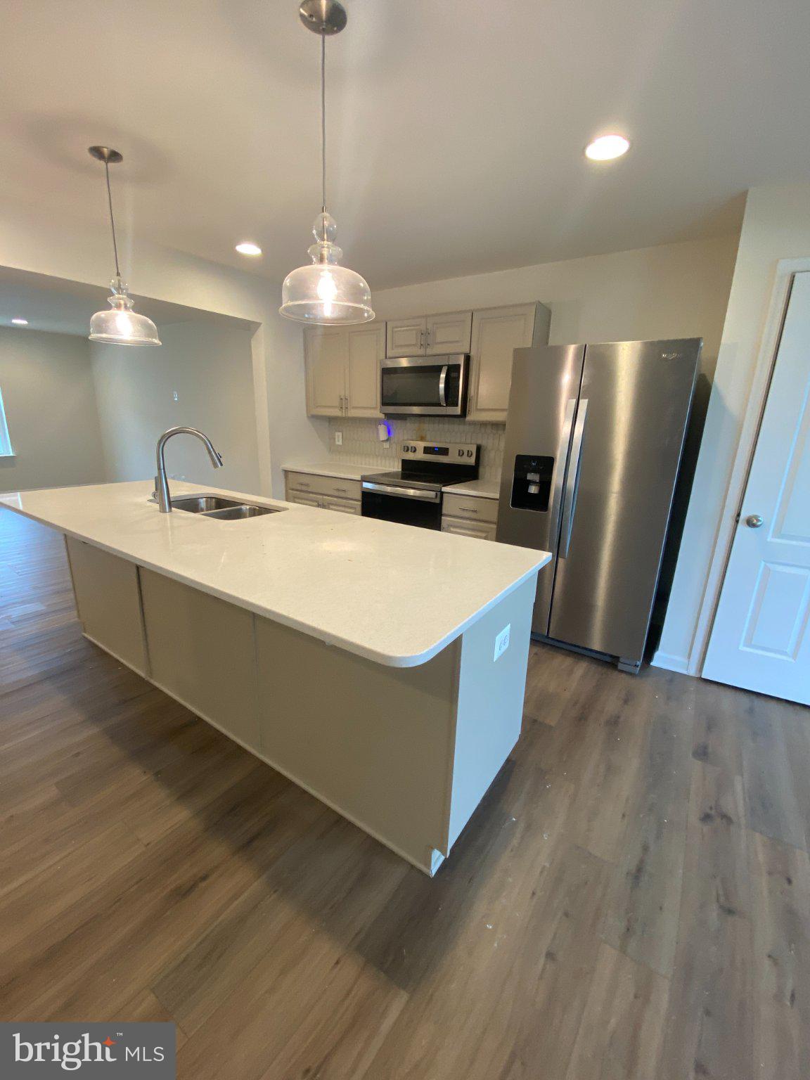 128 Tuxford Road Falling Waters, WV 25419 - Photo 5 of 27 Modern kitchen with sleek finishes.