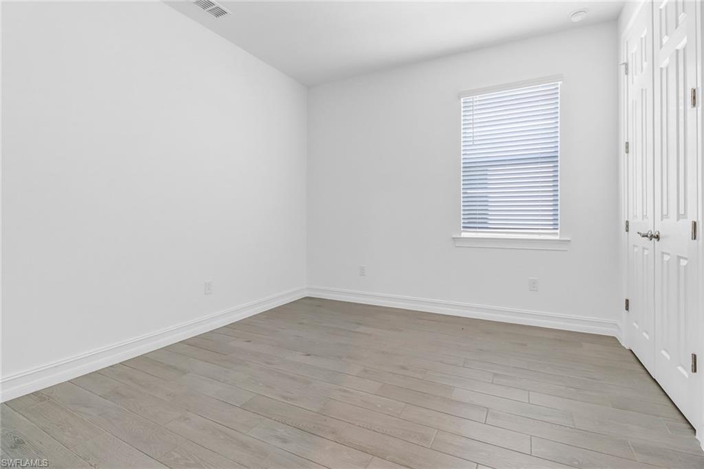 317 Spiaggio Court Naples, FL 34114 - Photo 14 of 46 an empty room with a window