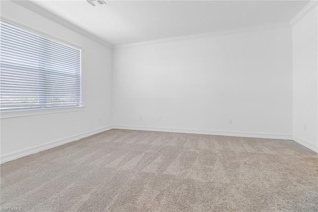 317 Spiaggio Court Naples, FL 34114 - Photo 18 of 46 an empty room with a window