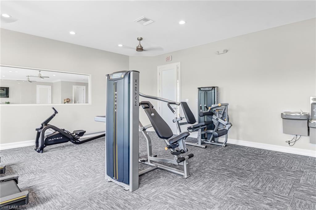 317 Spiaggio Court Naples, FL 34114 - Photo 43 of 46 a view of a room with gym equipment