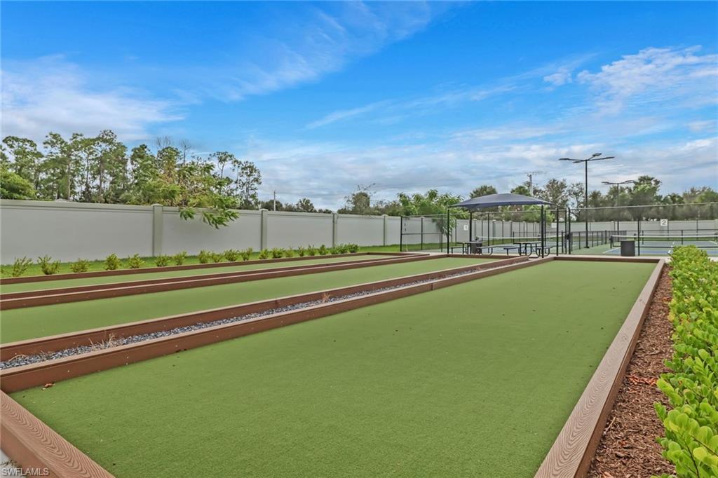 317 Spiaggio Court Naples, FL 34114 - Photo 45 of 46 a view of a green field with clear sky
