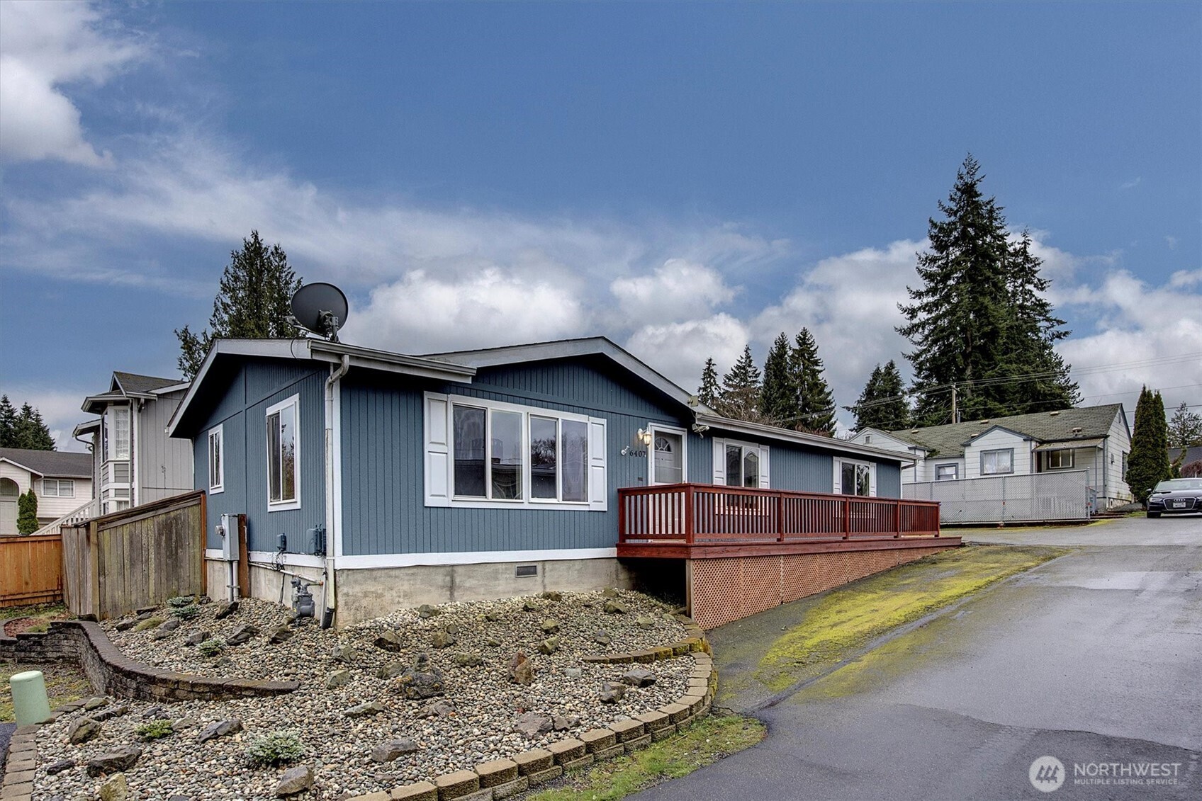 6407 Cady Road, Unit C Everett, WA 98203 - Photo 3 of 27 a view of a house with roof deck