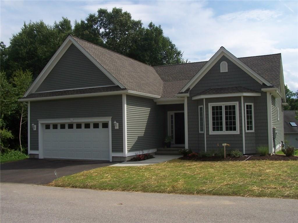 94 Stonehouse Road, Unit 24 Coventry, CT 06238 - Photo 1 of 1 a front view of a house with a yard