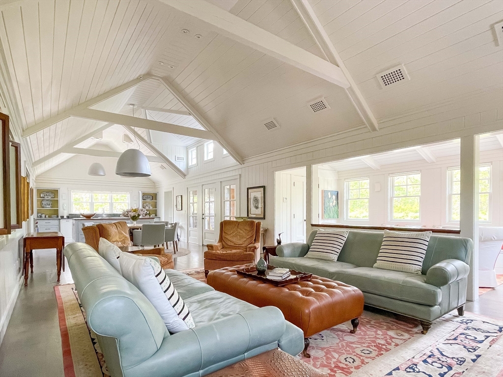 149 Litchfield Road Edgartown, MA 02539 - Photo 11 of 37 a living room with furniture and a large window