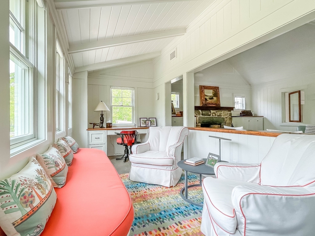 149 Litchfield Road Edgartown, MA 02539 - Photo 13 of 37 a living room with furniture and a flat screen tv