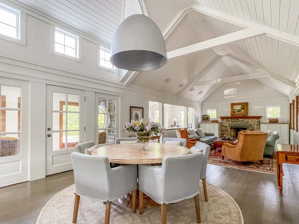 149 Litchfield Road Edgartown, MA 02539 - Photo 14 of 37 a view of a dining room with furniture window and wooden floor