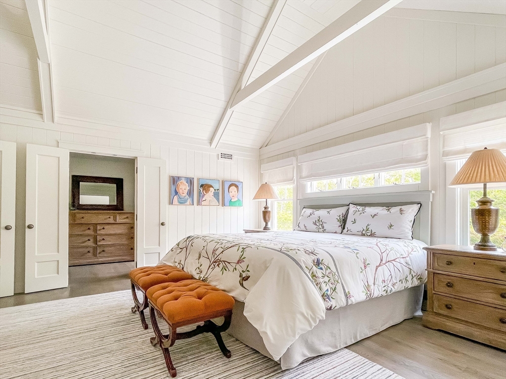 149 Litchfield Road Edgartown, MA 02539 - Photo 20 of 37 a bedroom with a bed and a couch