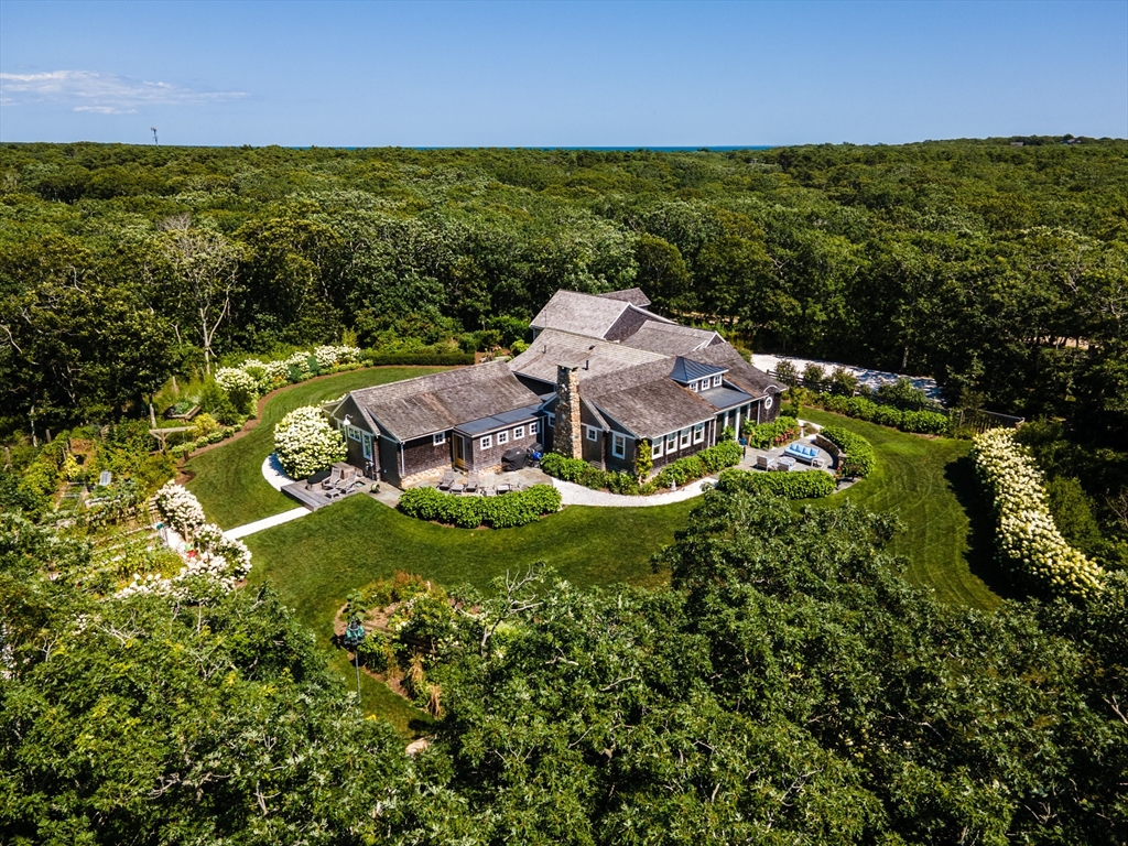 149 Litchfield Road Edgartown, MA 02539 - Photo 2 of 37 an aerial view of a house with a garden
