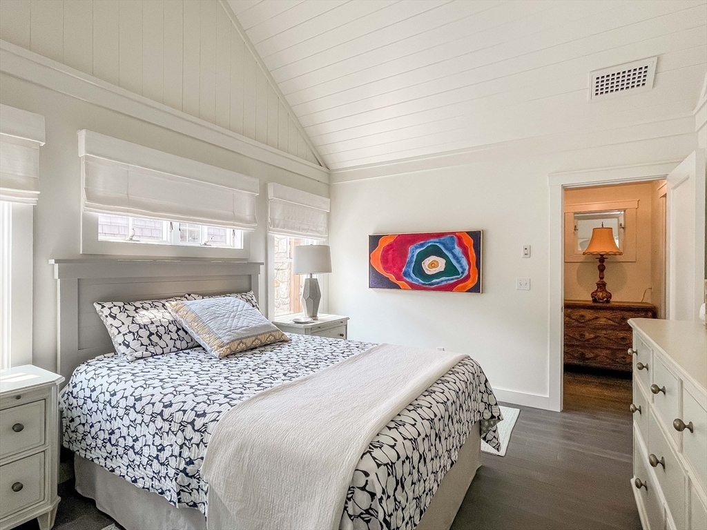 149 Litchfield Road Edgartown, MA 02539 - Photo 24 of 37 a bedroom with a bed and a window