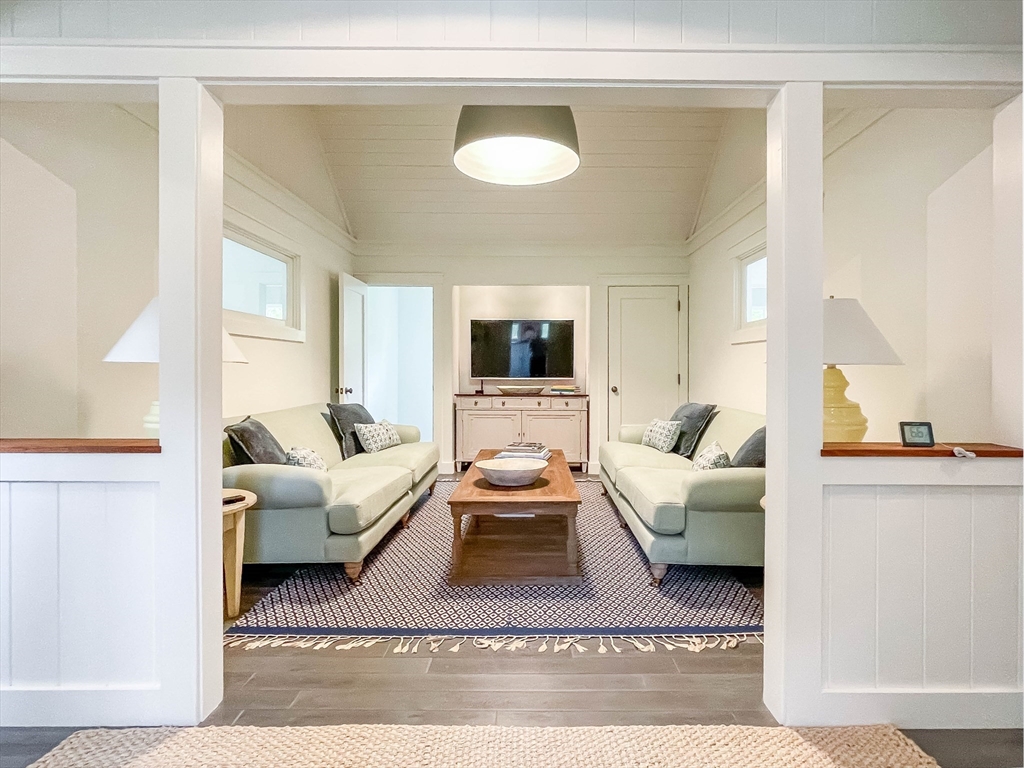 149 Litchfield Road Edgartown, MA 02539 - Photo 26 of 37 a living room with furniture and a flat screen tv