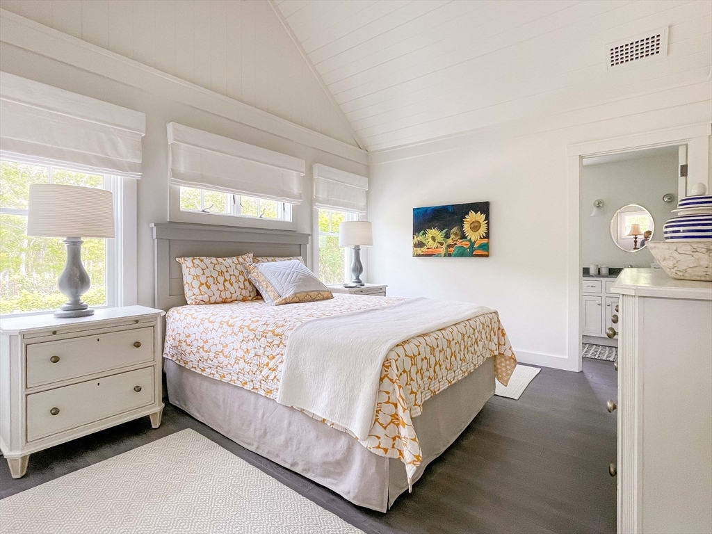 149 Litchfield Road Edgartown, MA 02539 - Photo 27 of 37 a bedroom with a bed and window