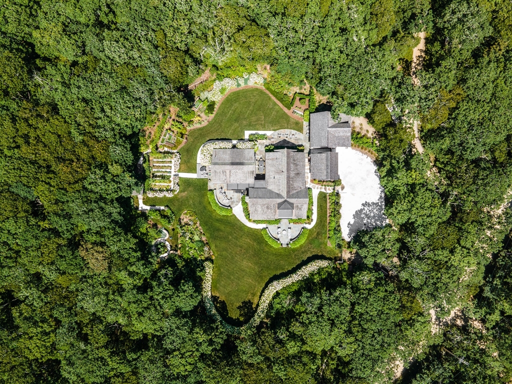 149 Litchfield Road Edgartown, MA 02539 - Photo 3 of 37 an aerial view of a house with outdoor space sitting space and trees all around