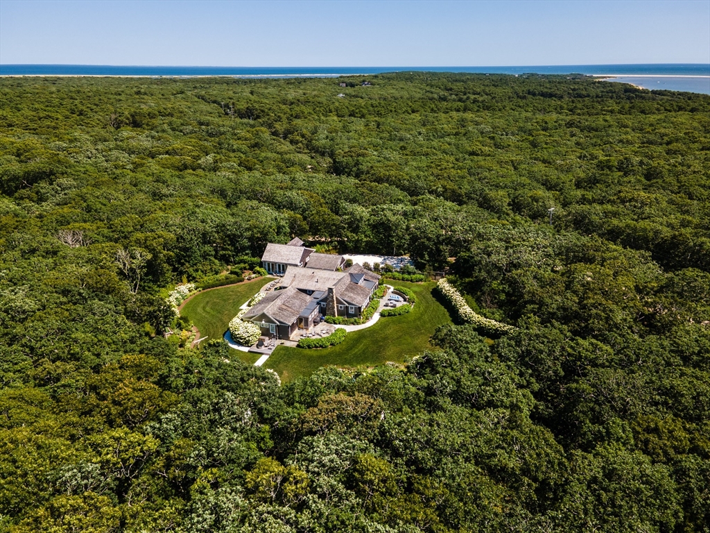 149 Litchfield Road Edgartown, MA 02539 - Photo 5 of 37 an aerial view of a house with a yard