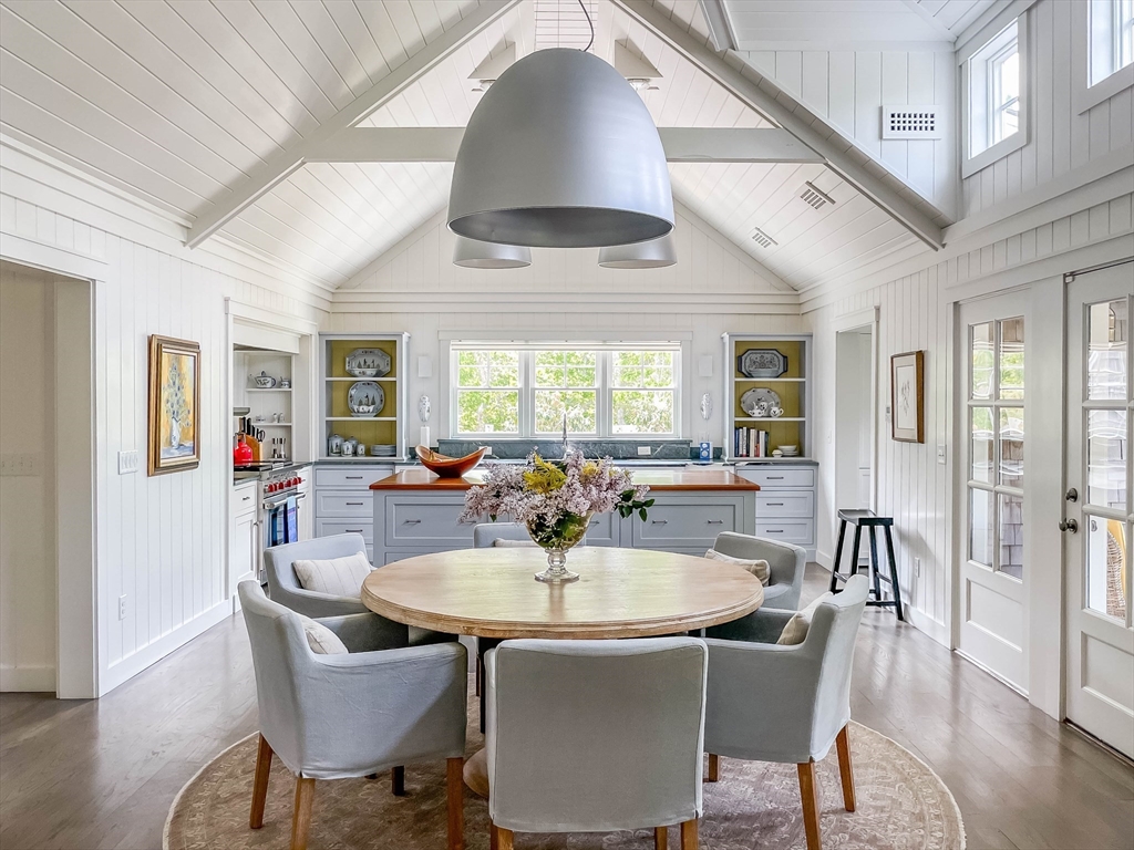 149 Litchfield Road Edgartown, MA 02539 - Photo 10 of 37 a dining room with furniture window and wooden floor