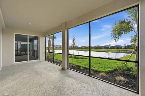 a view of kitchen with furniture and window