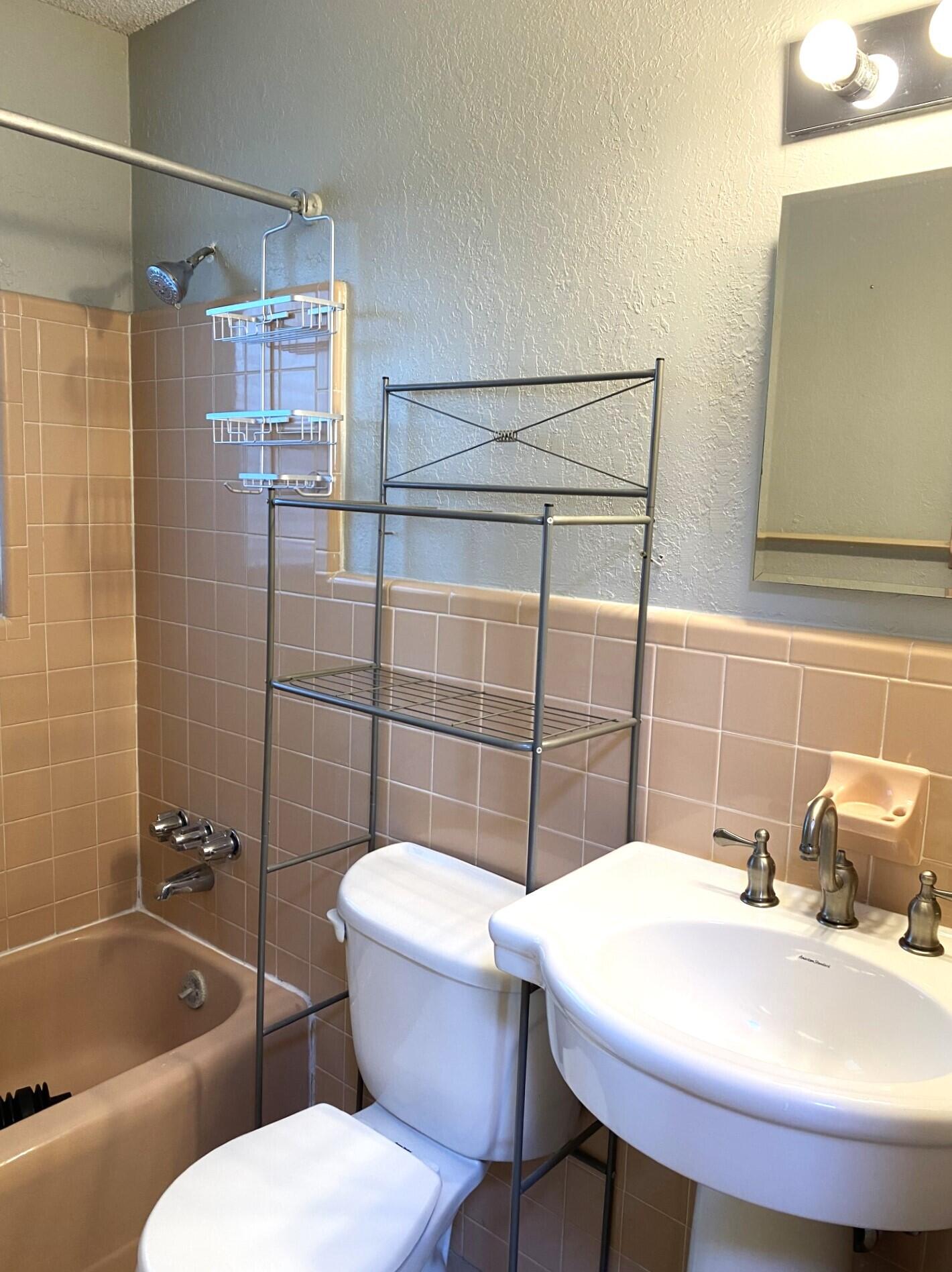 725 Mallard Road Cocoa, FL 32926 - Photo 15 of 37 a bathroom with a sink toilet and shower