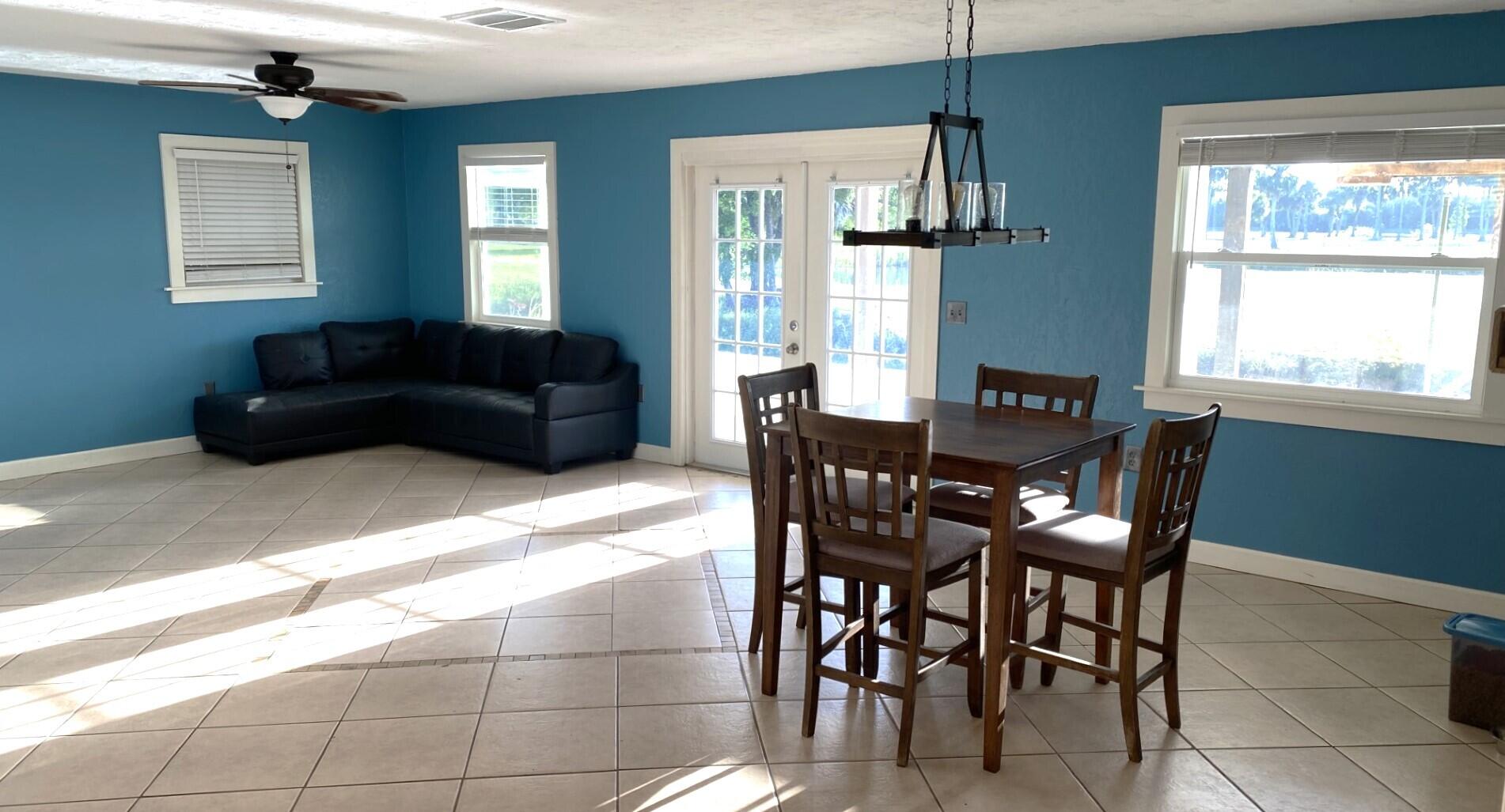 725 Mallard Road Cocoa, FL 32926 - Photo 27 of 37 a view of a dining room with furniture window and outside view