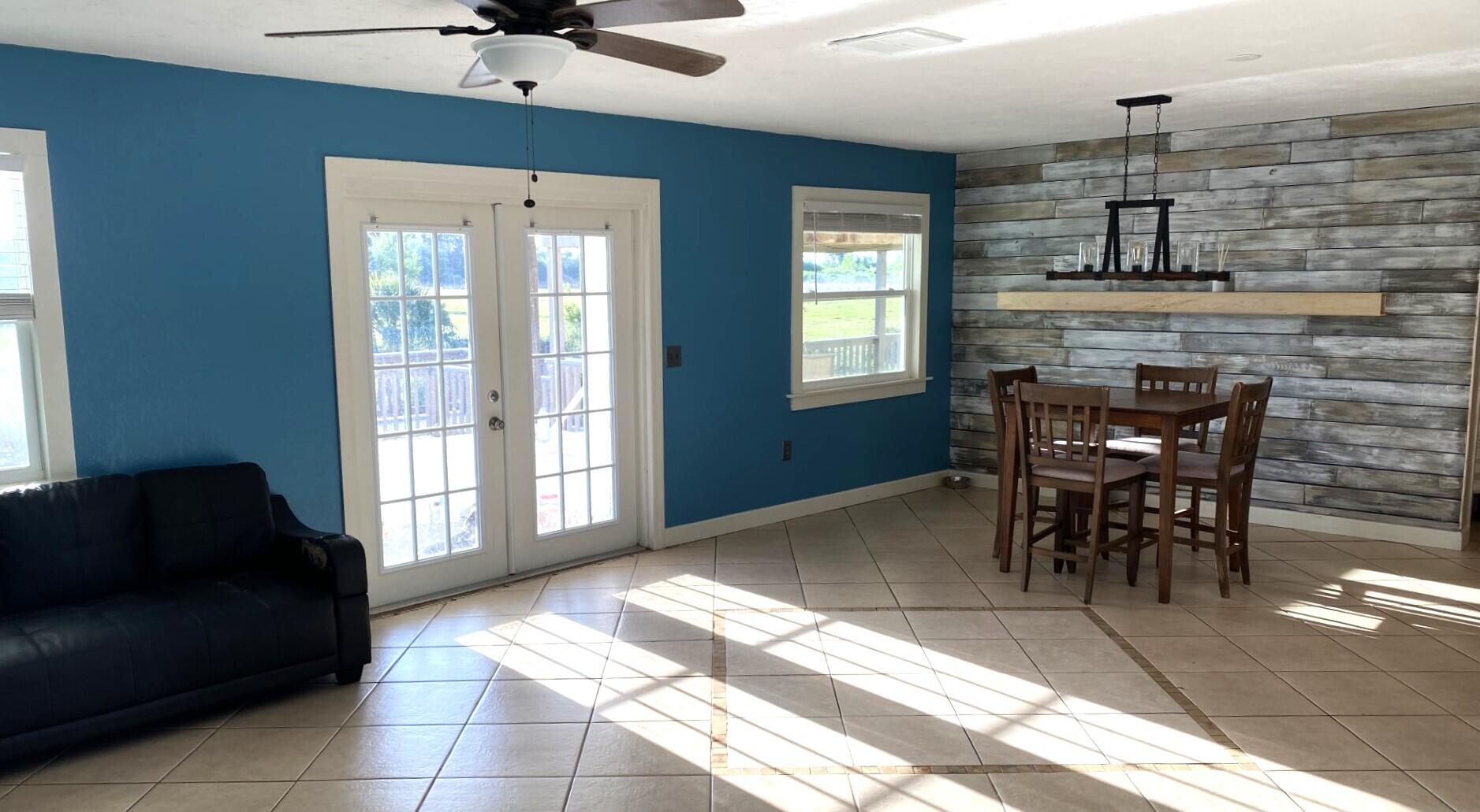 725 Mallard Road Cocoa, FL 32926 - Photo 28 of 37 a view of a livingroom with furniture and a window