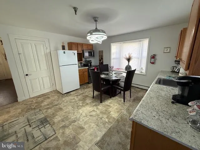 a view of a dining room with furniture