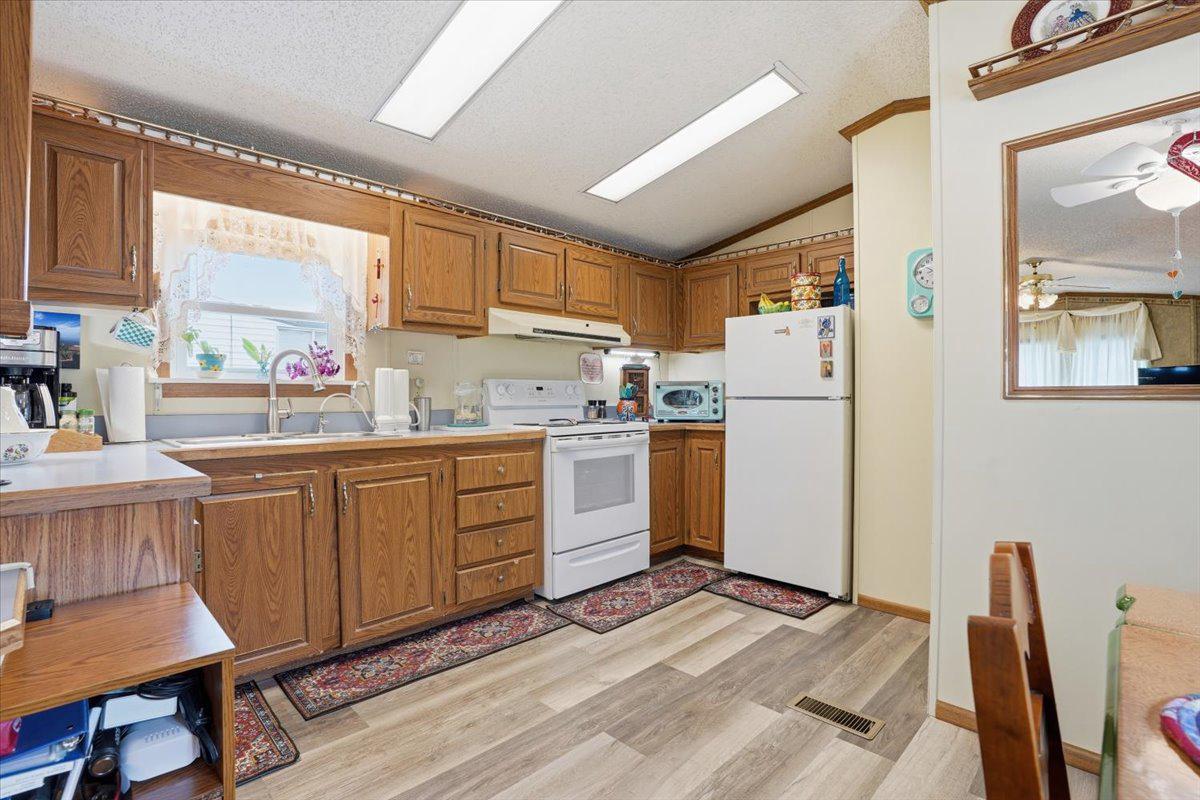 3350 Airport Road, Unit 5 Allentown, PA 18109 - Photo 16 of 53 Cozy kitchen with warm wood tones.