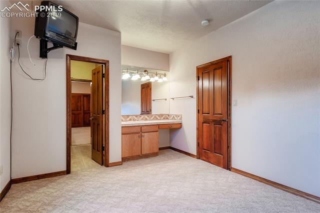 6155 Wilson Road Colorado Springs, CO 80919 - Photo 24 of 35 Basement bedroom #3