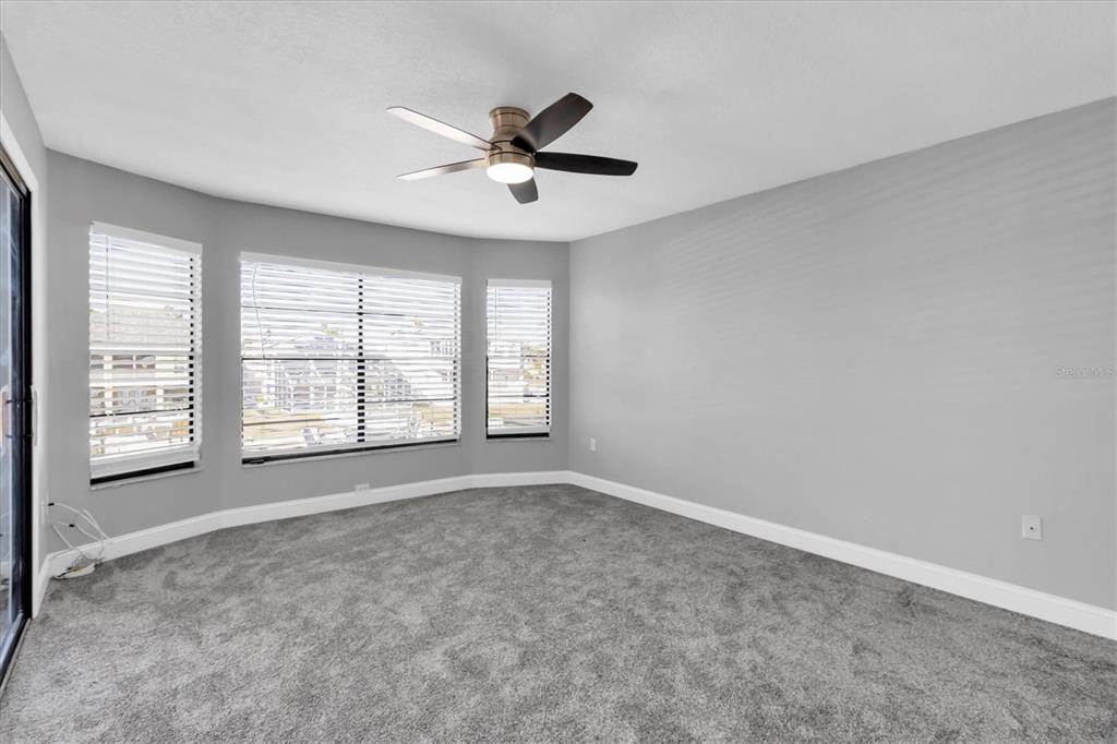 5925 Seaside Drive New Port Richey, FL 34652 - Photo 16 of 55 a view of an empty room with a window