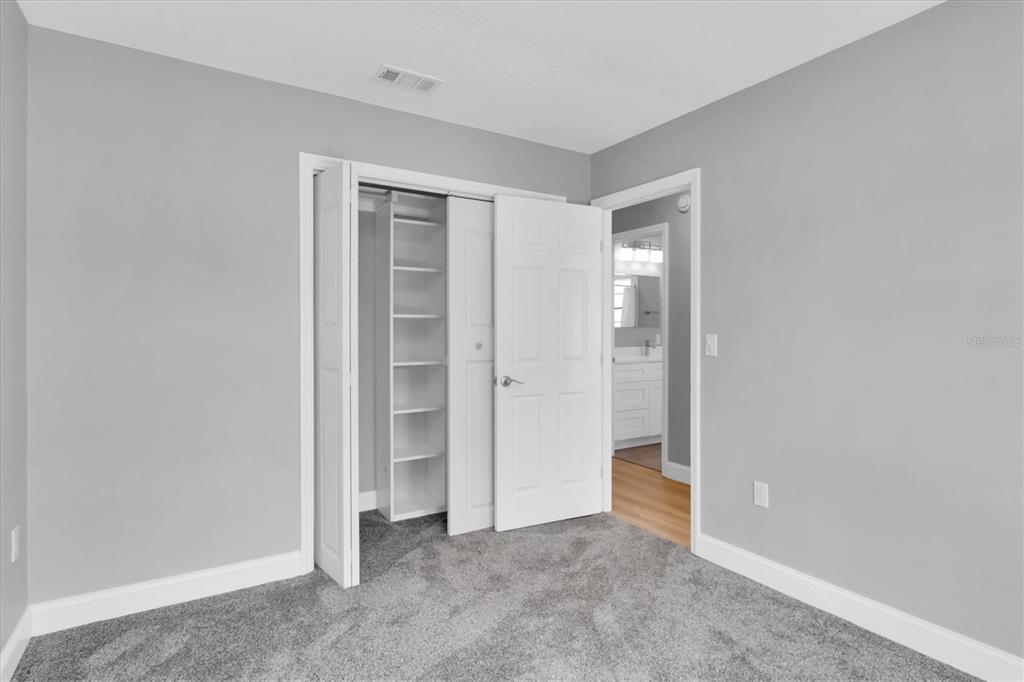 5925 Seaside Drive New Port Richey, FL 34652 - Photo 24 of 55 a view of an empty room with closet area