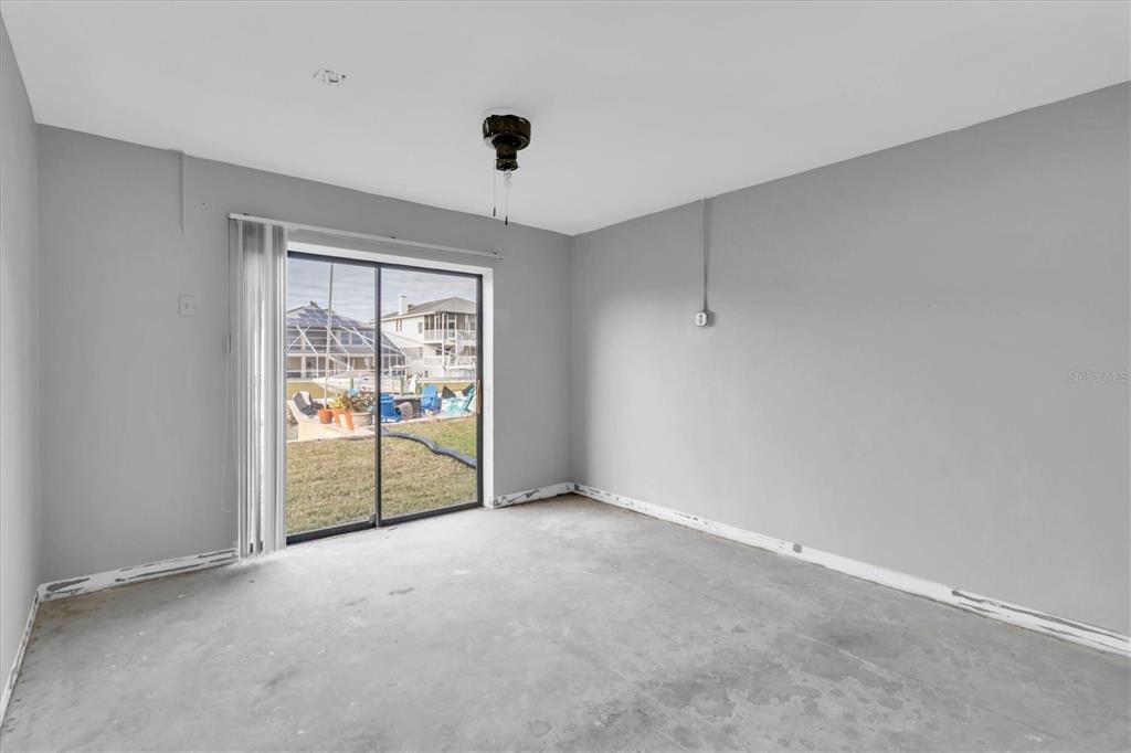 5925 Seaside Drive New Port Richey, FL 34652 - Photo 29 of 55 a view of an empty room with a window