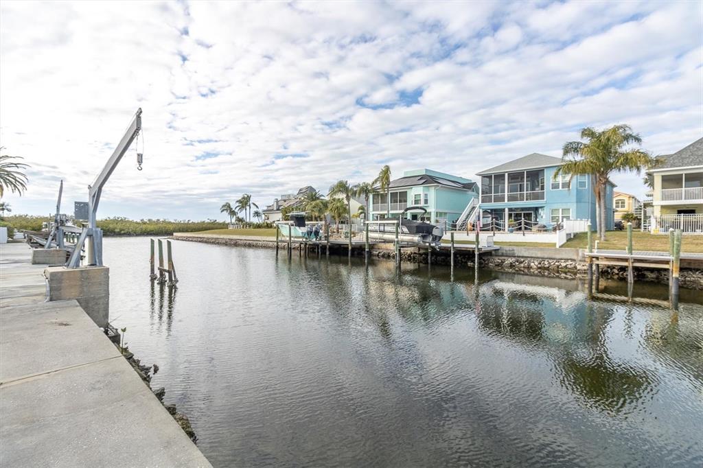 5925 Seaside Drive New Port Richey, FL 34652 - Photo 49 of 55 a view of residential house with outdoor space and lake view