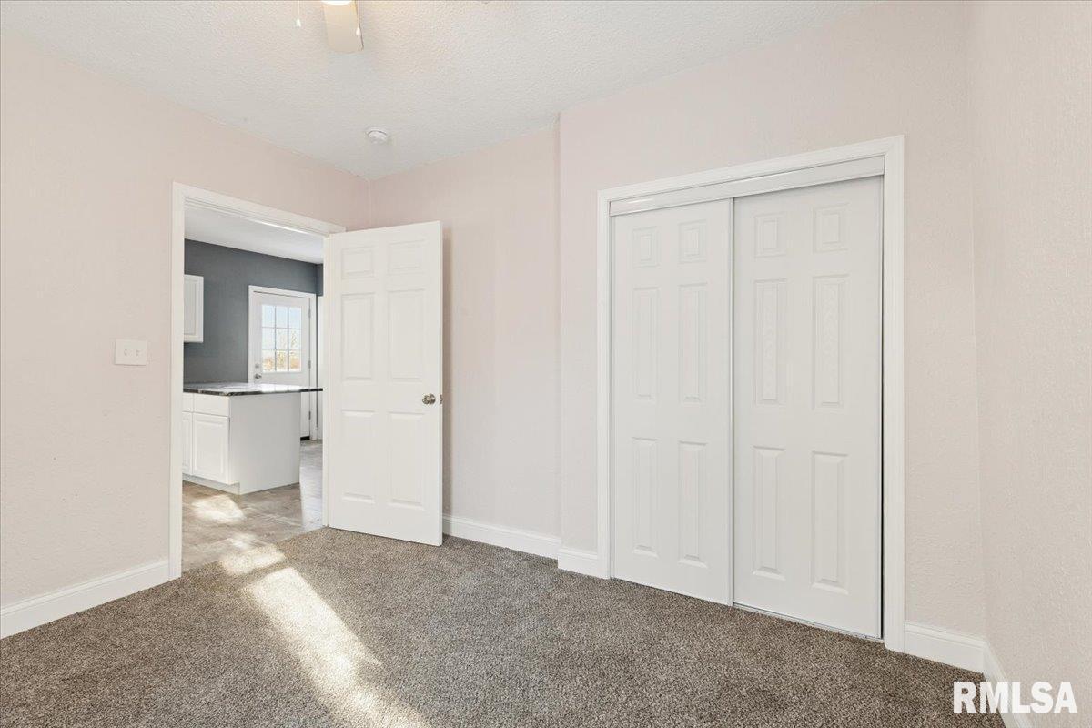 3312 Garfield Street Clinton, IA 52732 - Photo 13 of 31 a view of empty room with wooden floor